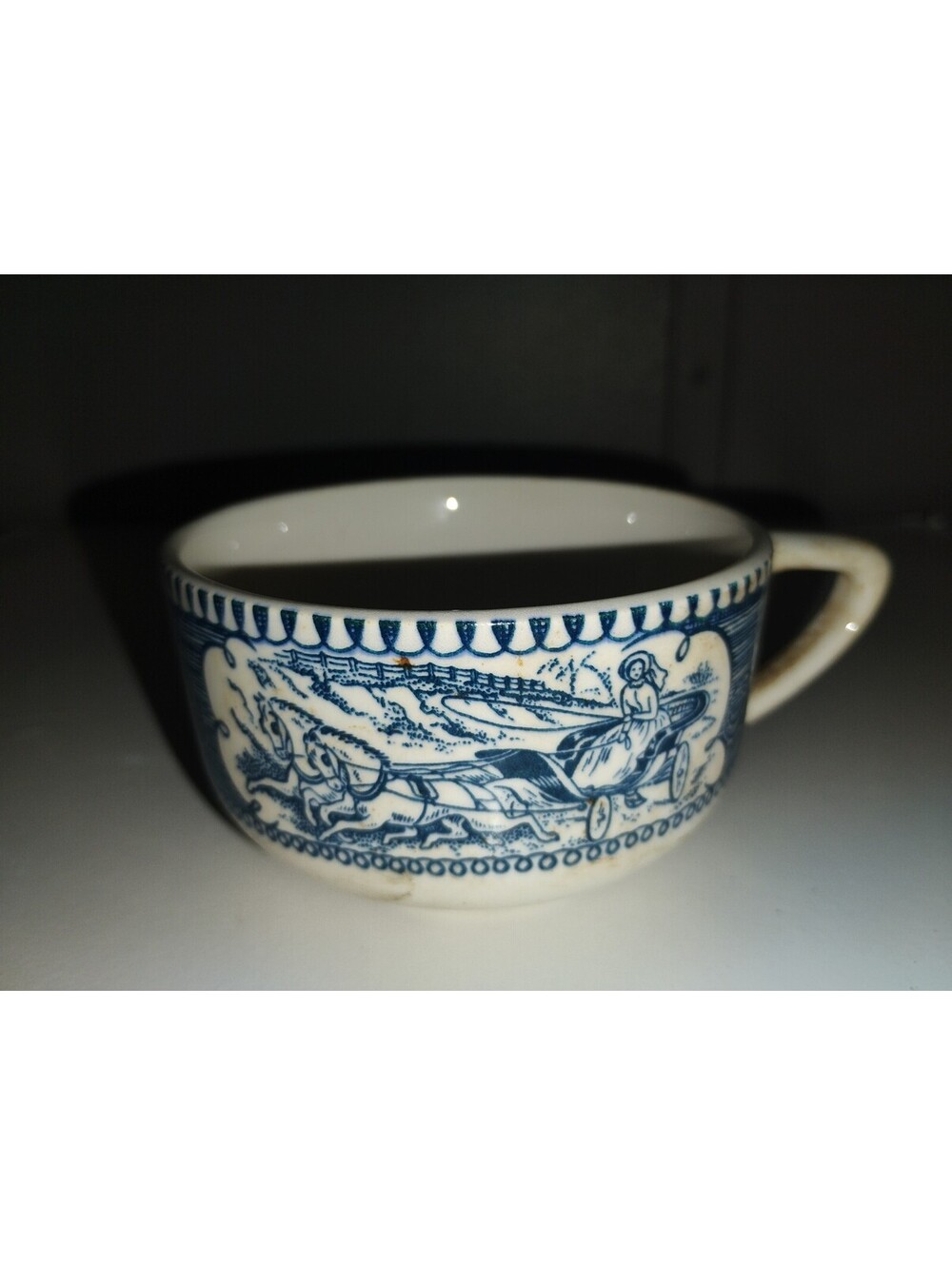 Vintage Blue and White Ceramic Cup with Horse and Carriage Design - Picture 2 of 5